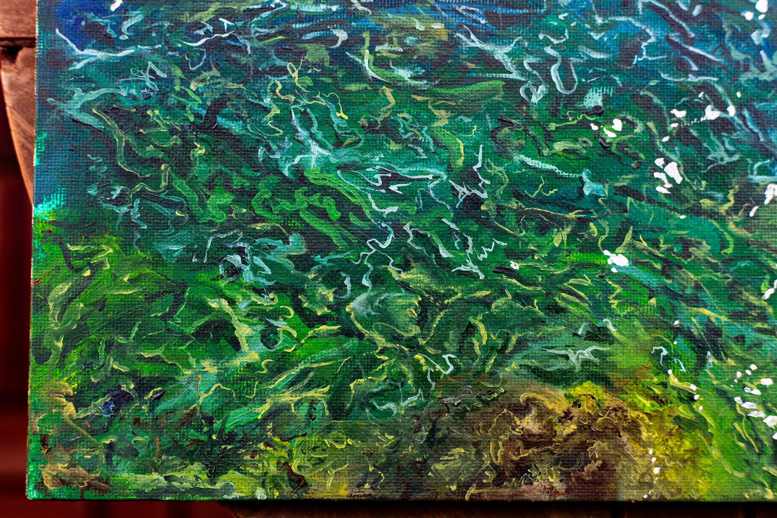 Lower edge of Water I, where the teal strokes shift into yellow-green and brown.