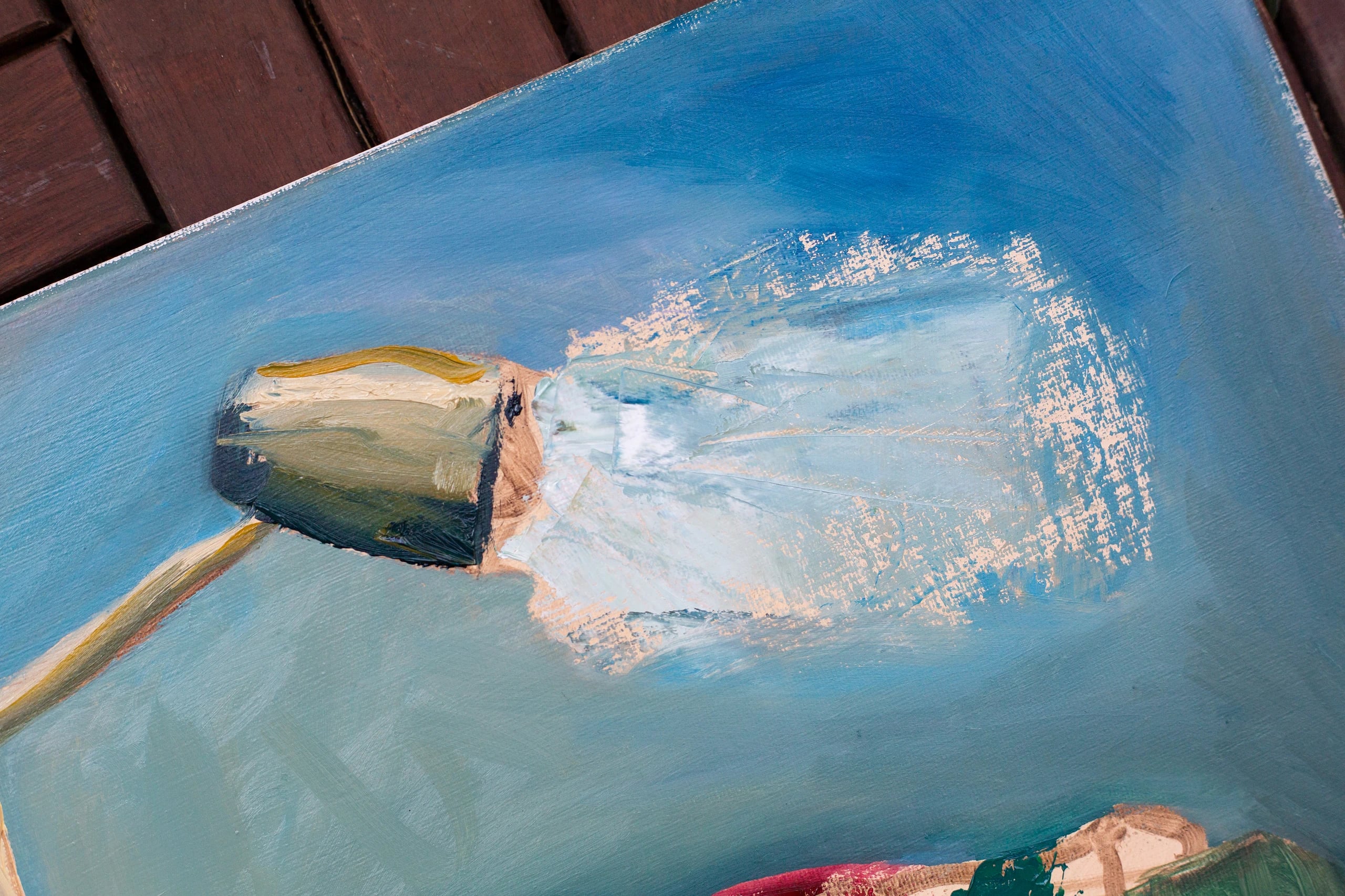 Close-up of the desk lamp in Still life of a corner, painted with loose, aggressive strokes of white and gold.