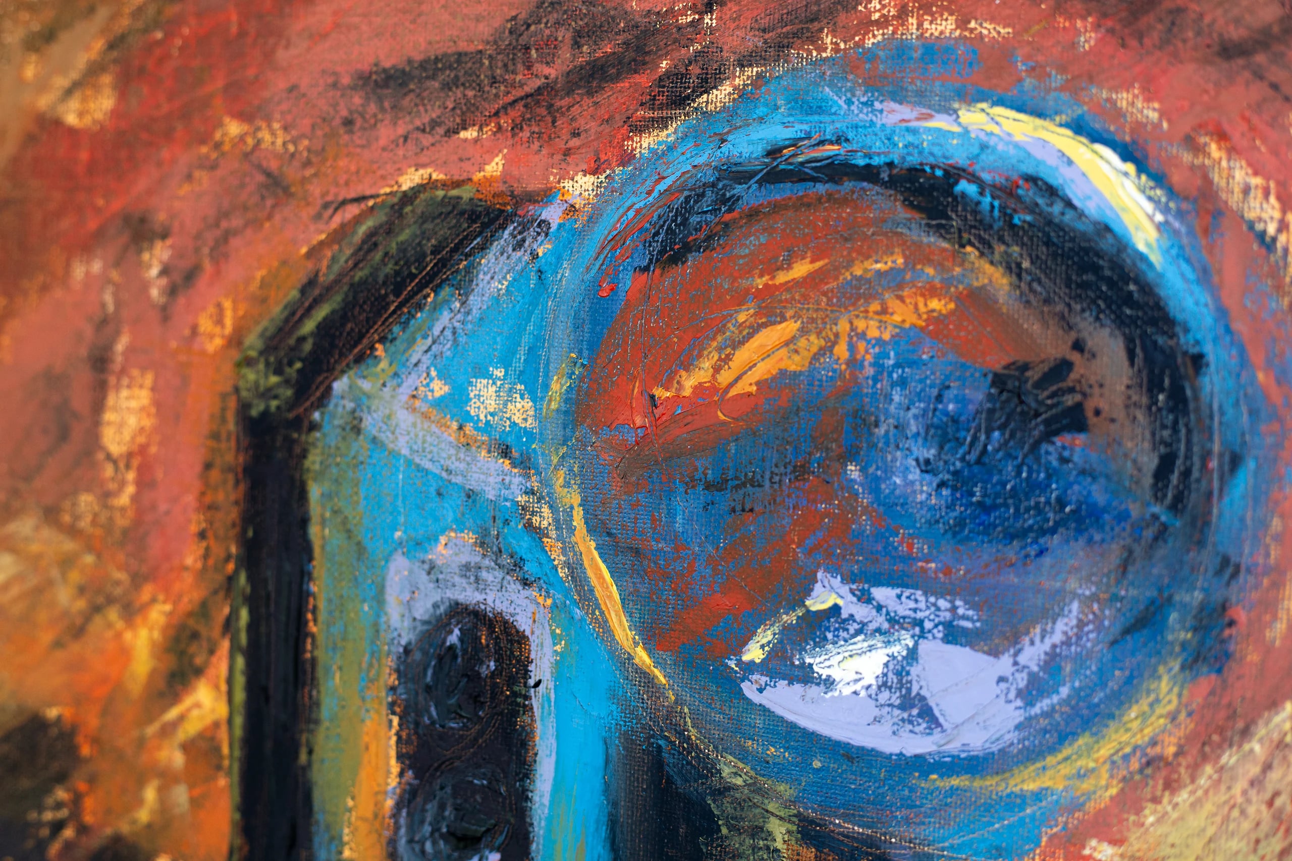 Close-up of the camera's blue flash reflector in Still life of a camera, surrounded by orange and red strokes.